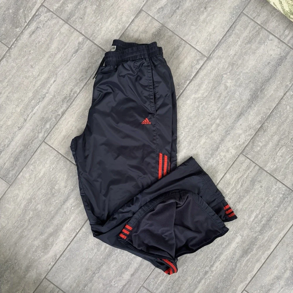 vintage Y2K-era black Adidas nylon windbreaker track pants Linned Size Large